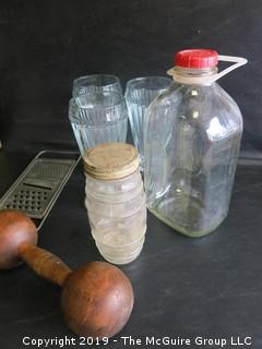 Collection including milk bottle, NJ license plates, wooden dumbell, (3) sofa fountain ice cream sundae glasses, kitchen grater and Zenith Radio