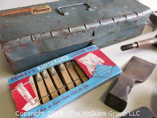 Collection of old tools including toolbox, arbor, (2) hand drills, hatchet blade, flat iron and NIB clothespins  