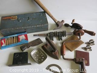 Collection of old tools including toolbox, arbor, (2) hand drills, hatchet blade, flat iron and NIB clothespins  