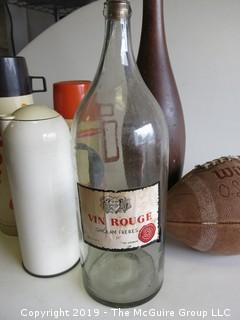 Collection including wooden duck pin, oversized wine bottle, "O.J. Simpson" branded football and (2) Dunkin Donuts Carafes