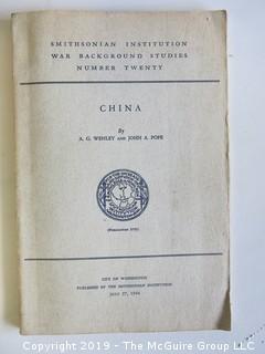 Collection of books including U.S. Military Manuals