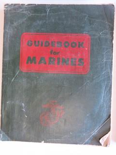 Collection of books including U.S. Military Manuals