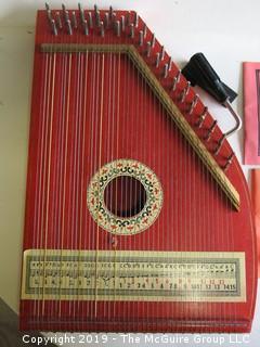 Collection including musical instrument and book/record