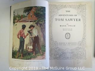 (2) Books: "The Adventures of Tom Sawyer" and "The Adventures of Huckleberry Finn"; both by Mark Twain; published by Harper and Brothers  