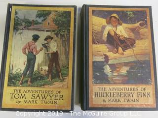 (2) Books: "The Adventures of Tom Sawyer" and "The Adventures of Huckleberry Finn"; both by Mark Twain; published by Harper and Brothers  