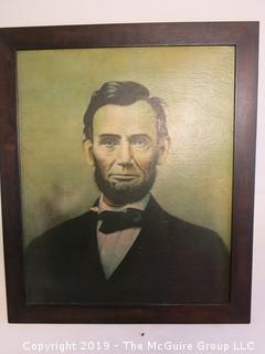 Framed Print of Abraham Lincoln; outside dimensions 23 1/2 x 27 1/2" (Note: Damage on collar of Lincoln; description altered 05.19.@2:21pm)