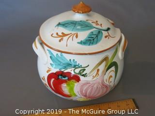 Double Handled Faience Painted Covered Tureen with hand painted floral motif; marked Italy on base; 9" diameter 