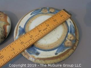 Glazed stoneware footed trivet; signed "Colby"; 7 1/2" base diameter {Description altered 6.13 @3:27pm ET}  