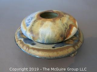 Glazed stoneware footed trivet; signed "Colby"; 7 1/2" base diameter {Description altered 6.13 @3:27pm ET}  