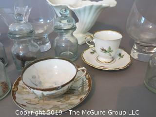 Collection including ceramic, glass, and porcelain tea cups