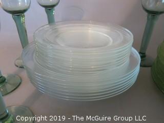 Collection of glass dinner plates and stems