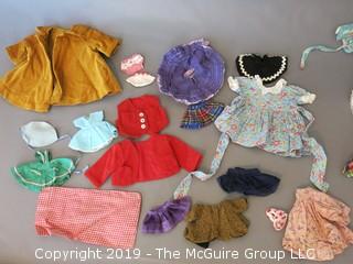 Collection of doll clothes and accessories; includes Vogue box and contents as well as 1935 Raggedy Ann Coin Purse