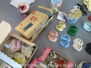 Collection of doll clothes and accessories; includes Vogue box and contents as well as 1935 Raggedy Ann Coin Purse