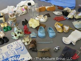 Collection of doll clothes and accessories; includes Vogue box and contents as well as 1935 Raggedy Ann Coin Purse