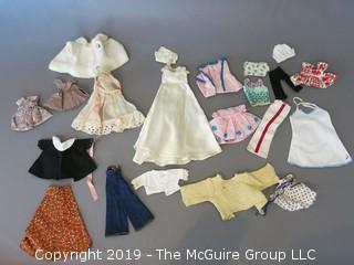 Collection of doll clothes and accessories; includes Vogue box and contents as well as 1935 Raggedy Ann Coin Purse