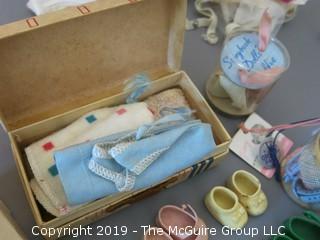 Collection of doll clothes and accessories; includes Vogue box and contents as well as 1935 Raggedy Ann Coin Purse