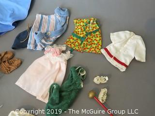 Collection of doll clothes and accessories; includes Vogue box and contents as well as 1935 Raggedy Ann Coin Purse