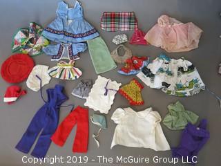 Collection of doll clothes and accessories; includes Vogue box and contents as well as 1935 Raggedy Ann Coin Purse