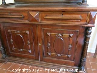 South American 2 sectional cupboard with double glass panel doors; resting on a raised panel cabinet base; 55"Wide x 90"Tall x 24 1/2"Deep; {Description altered 6.13.2019 @3:12pm ET} 