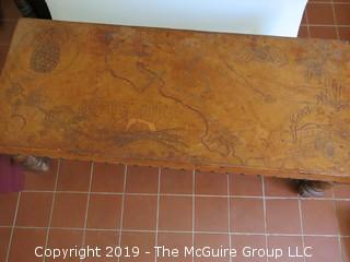 Hand-Tooled Leather covered rectangular coffee table, raised on turned legs