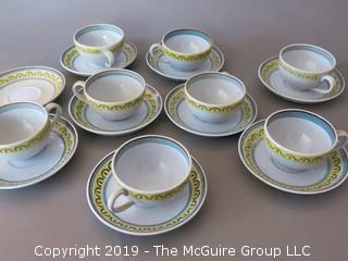 Set of (9) porcelain  plates and (8) matching cups; hand painted; made in Finland