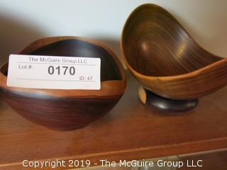 (2) Lathe turned wooden sculptural bowls; one signed 