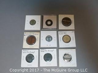 Collection of 9 tokens including Telephone Co. and Sales Tax