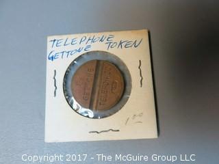 Collection of 9 tokens including Telephone Co. and Sales Tax