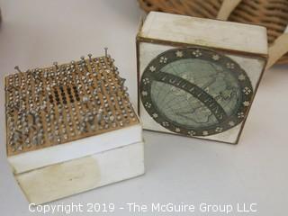 Collection including a box of toilet pins, spools with brass locking rings, 1929 wall calendar and a woven pith helmut