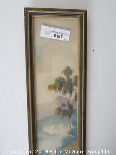 Framed landscape painting under glass; signed lower left