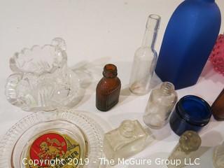 Collection of mostly vintage bottles, ashtrays and porcelain tea cups/saucers