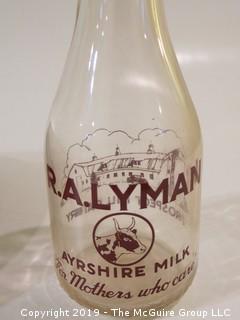 Collection including R. A. Lyman Milk Bottle: "For Mothers Who Care"