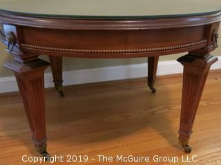 Glass covered Mahogany low table (29" diameter; 19" Tall)