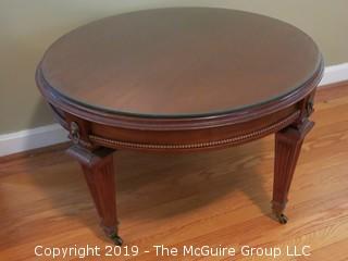 Glass covered Mahogany low table (29" diameter; 19" Tall)