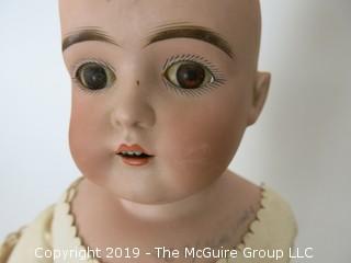 Bisque Doll with reclining eyes; marked; 7 1/2 head