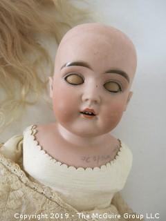 Bisque Doll with reclining eyes; marked; 7 1/2 head