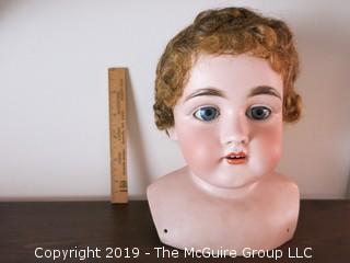 Bisque Doll with reclining eyes; made in Germany; marked