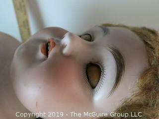 Bisque Doll with reclining eyes; made in Germany; marked