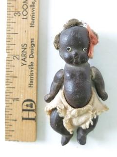 Black porcelain Kewpie doll