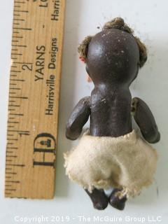 Black porcelain Kewpie doll