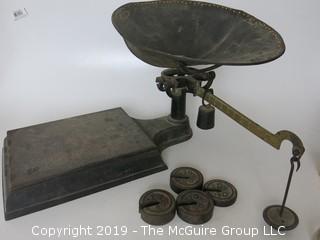 Shopkeepers counterbalance scale with brass dial, weights. 