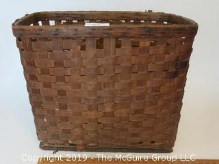 Large antique weavers basket.  There is some age damage, but still functional (14 x 19 x 22")