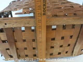 Large antique weavers basket.  There is some age damage, but still functional (14 x 19 x 22")