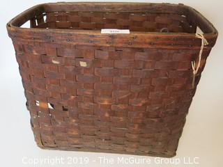 Large antique weavers basket.  There is some age damage, but still functional (14 x 19 x 22")