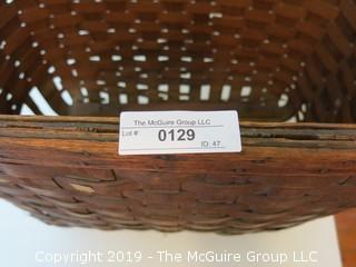 Large antique weavers basket.  There is some age damage, but still functional (14 x 19 x 22")