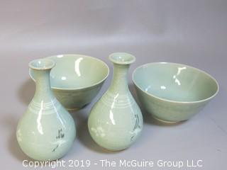 Set of matching Chinese glazed ceramic bowls and hand decorated vases 