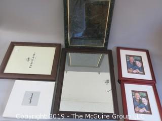 Collection of picture frames, wall mirror (frame damage) marbleized certificate holder and  Pierre Cardin lace set