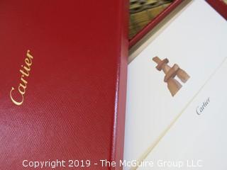 Collection including Cartier stationary and reproduction terra cotta figurine from the Tashimas 