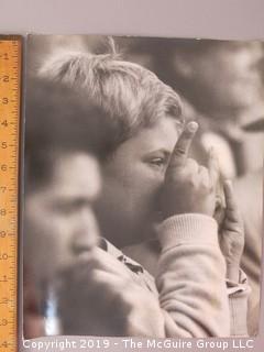 A Young Brooklyn Dodger Fan Tries in Vain to Put a Finger Hex on the Yankees during the 7th inning of the 7th game of the World Series at Ebbets Field.  It didn't work.  