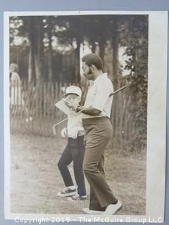 Collection of Large Format B + W Photos; including Mercury Morris playing basketball, golfers consulting the voluminous rule book